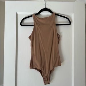 Skims High Neck Bodysuit - Color OCHRE